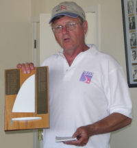 Jim accepting another race trophy, 2005 in Muskegon